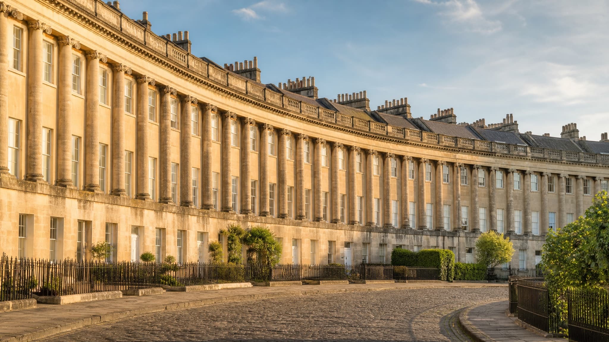 An elegant Georgian stone crescent of townhouses